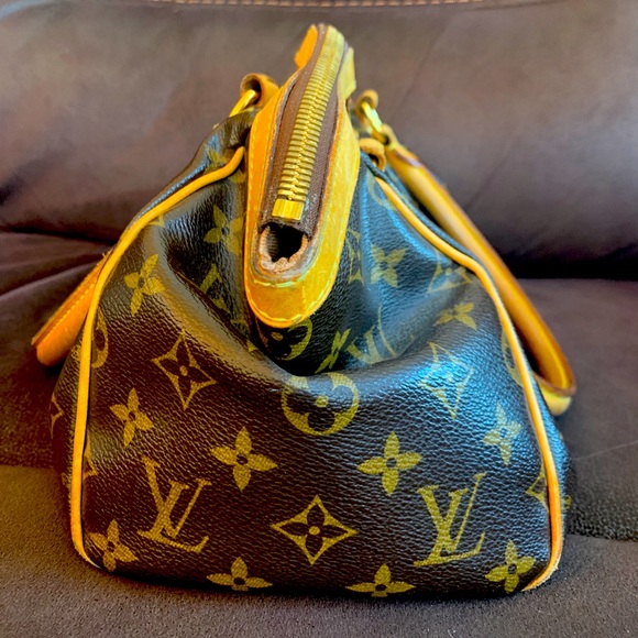 Authentic Louis Vuitton Tivoli with dust bag. - Picture 2 of 12